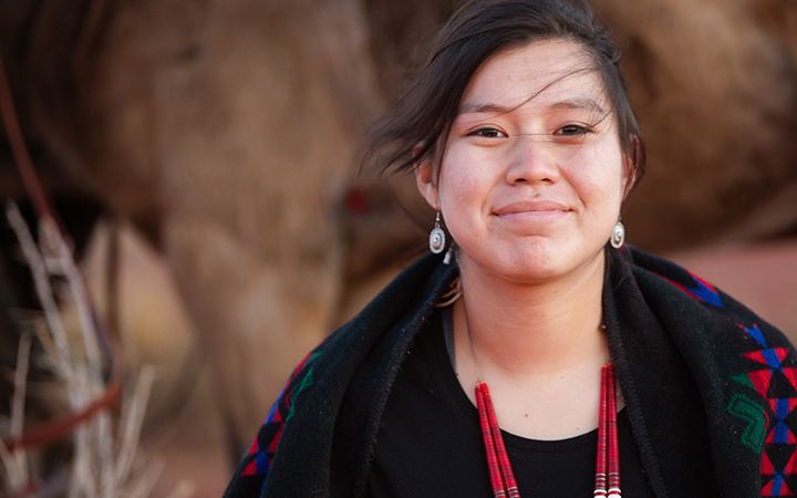 A woman smiling
